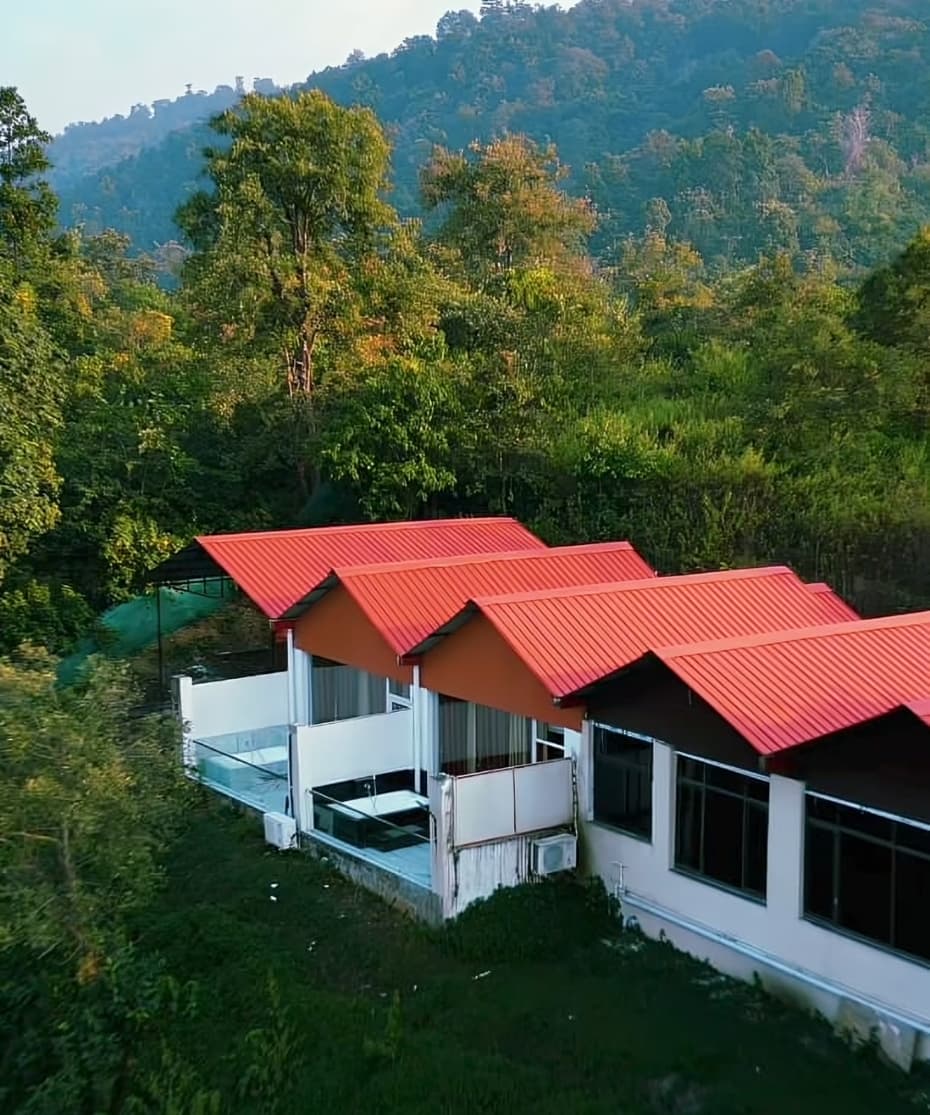 Eternity resort exterior with mountain backdrop